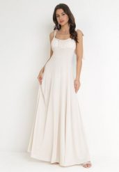 Beżowa Rozkloszowana Sukienka Maxi z Wiązanymi Ramiączkami Lisija. Brązowe sukienki damskie Born2be, m, bez wzorów, eleganckie, bez kołnierzyka, bez ramiączek, maxi, rozkloszowane. W wyprzedaży za 119.99 zł.