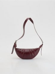 Torebka saszetka - bordowy. Czerwone torebki klasyczne damskie Reserved, bez wzorów, ze skóry, bez dodatków. Za 129.99 zł.