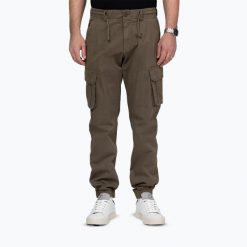 Spodnie męskie Pitbull Proctor Drawstring Joggery Cargo. Zielone spodnie sportowe męskie PITBULL, z bawełny. Za 229.99 zł.