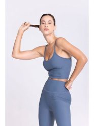 Onamaste Top sportowy w kolorze niebieskim rozmiar: L/XL. Niebieskie topy damskie Onamaste, l, bez wzorów, z materiału, bez ramiączek. Za 121.99 zł.