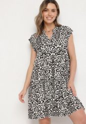 Czarna Bawełniana Sukienka o Rozkloszowanym Kroju Oversize Liravina. Czarne sukienki damskie Born2be, na co dzień, l, bez wzorów, z bawełny, eleganckie, bez kołnierzyka, bez ramiączek, midi, oversize. W wyprzedaży za 43.99 zł.