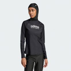 Koszulka Long Sleeve Rash Guard. Czarne t-shirty damskie Adidas, m, bez wzorów, z materiału, bez kołnierzyka. W wyprzedaży za 186.10 zł.