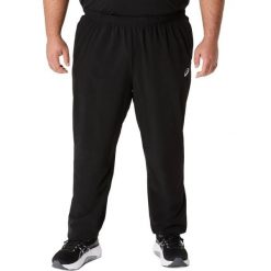 Spodnie dresowe Asics Core woven. Czarne szorty męskie Asics, bez wzorów, z dresówki. Za 248.75 zł.