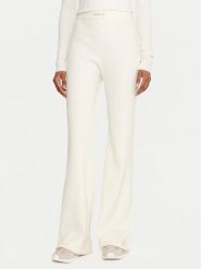 Guess Legginsy V5BB08 Z3JD2 Écru Flare Fit. Legginsy sportowe damskie Guess, l, z aplikacjami, z syntetyku. Za 299.99 zł.