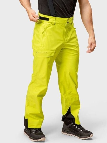 Halti Spodnie narciarskie "Settler DX" w kolorze żółtym rozmiar: L. Żółte spodnie materiałowe męskie Halti, bez wzorów. Za 676.04 zł.