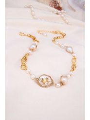 Pierres delicates Naszyjnik w kolorze białym z perłami - dł. 45 cm rozmiar: onesize. Białe naszyjniki damskie Pierres delicates, z mosiądzu. Za 213.18 zł.