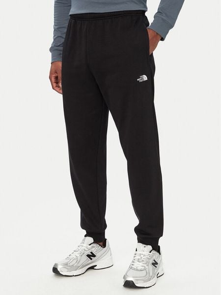 The North Face Spodnie dresowe Evolution Simple Dome NF0A8CWY Czarny Regular Fit. Czarne spodnie dresowe męskie The North Face, bez wzorów, z bawełny. Za 279.99 zł.