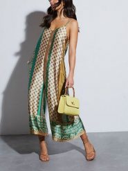 Milan Kiss Kombinezon w kolorze zielonym ze wzorem rozmiar: S. Zielone kombinezony damskie Milan Kiss, s, bez wzorów, bez kołnierzyka, bez ramiączek. Za 158.10 zł.