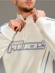 Bluza z nadrukiem i kontrastową lamówką - kremowy. Białe bluzy bez kaptura męskie Sinsay, l. Za 69.99 zł.