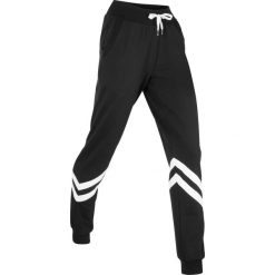 Spodnie dresowe z paskami. Czarne spodnie dresowe damskie bonprix, z dresówki, na fitness i siłownię. Za 94.99 zł.