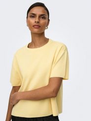 JDY Koszulka "Astra" w kolorze żółtym rozmiar: M. Żółte t-shirty damskie JDY, m, bez wzorów, bez kołnierzyka. Za 91.99 zł.