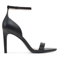 Sandały Calvin Klein. Czarne sandały damskie CALVIN KLEIN, bez wzorów, bez obcasa, na szpilce. Za 449.99 zł.
