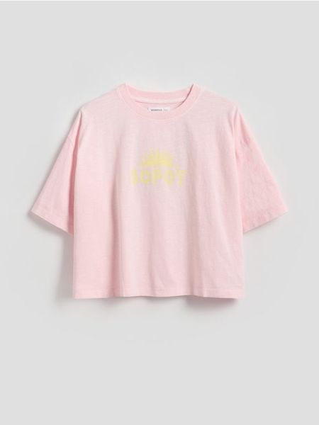 Luźny t-shirt z nadrukiem - różowy. Czerwone koszulki dziewczęce Reserved, bez wzorów, z bawełny, bez ramiączek. W wyprzedaży za 9.99 zł.