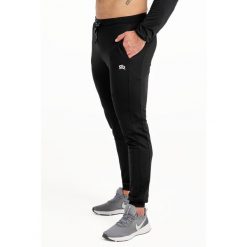 Spodnie fitness męskie Rough Radical Snappy. Czarne spodnie sportowe męskie ROUGH RADICAL. W wyprzedaży za 119.20 zł.