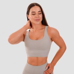 Biustonosz sportowy damski fitness z wycięciem szary Cut-Out. Szare biustonosze sportowe damskie GYMBEAM, bez wzorów, z elastanu. Za 81.90 zł.
