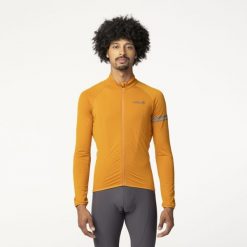 Męska koszulka rowerowa termoaktywna z długim rękawem Essential pomarańczowa. Brązowe t-shirty sportowe męskie Agu, m, z materiału, bez ramiączek, na fitness i siłownię. Za 357.25 zł.