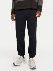 Jack & Jones Spodnie dresowe Morgan 12257964 Czarny Regular Fit. Czarne spodnie dresowe męskie Jack & Jones, bez wzorów, z bawełny. Za 119.99 zł.
