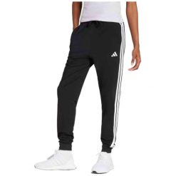 Damskie spodnie dresowe adidas Essentials 3-Stripes. Czarne spodnie sportowe damskie Adidas, s, z bawełny, na fitness i siłownię. Za 224.20 zł.
