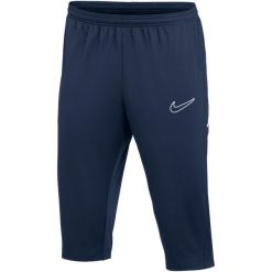 Spodnie męskie Nike Dri-Fit Academy 25 3/4. Niebieskie spodnie materiałowe męskie Nike, bez wzorów, z poliesteru. Za 108.99 zł.