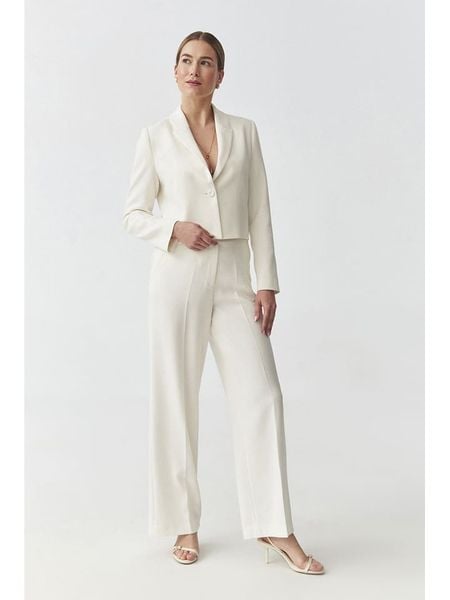 TATUUM Spodnie w kolorze kremowym rozmiar: 40. Brązowe spodnie materiałowe damskie Tatuum, bez wzorów, z materiału, z podwyższonym stanem. Za 203.93 zł.