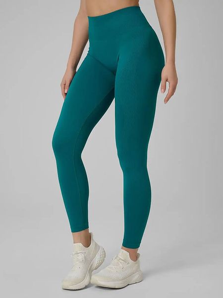 4F Legginsy sportowe w kolorze turkusowym rozmiar: M/L. Niebieskie legginsy damskie 4f, l, bez wzorów, z materiału. Za 87.81 zł.