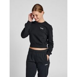 Damska krótka bluza Hummel LGC Shai. Czarne bluzy sportowe damskie HUMMEL, s, bez wzorów, z bawełny, bez ramiączek, krótkie, bez kaptura. Za 230.35 zł.