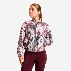 Bluza sportowa damska Domyos. Fioletowe bluzy z kapturem damskie DOMYOS, l, z materiału. Za 99.99 zł.