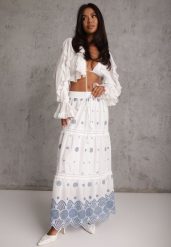 Biało-Niebieska Bawełniana Spódnica Casual w Stylu Boho Ozdobiona Wycięciami i Haftowanymi Wzorami Hermat. Niebieskie spódniczki damskie Renee, l, z aplikacjami, z bawełny, boho, z podwyższonym stanem, maxi, dopasowane. Za 129.99 zł.