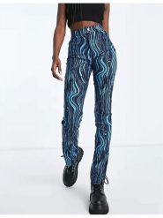 Monki Spodnie w kolorze granatowo-turkusowym rozmiar: 36. Niebieskie spodnie materiałowe damskie Monki, bez wzorów, z materiału, z podwyższonym stanem. Za 43.99 zł.