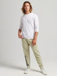 Superdry Spodnie dresowe w kolorze beżowym rozmiar: XXL. Brązowe spodnie dresowe męskie Superdry., bez wzorów, z bawełny. Za 145.94 zł.