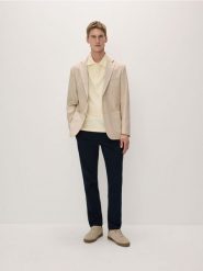 Spodnie chino - granatowy. Niebieskie spodnie materiałowe męskie Reserved, bez wzorów, z bawełny. W wyprzedaży za 49.99 zł.