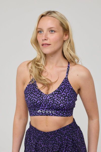 Biustonosz sportowy Infinite o średnim wsparciu - Fioletowy Leopard. Fioletowe biustonosze sportowe damskie OOSC, bez wzorów, z materiału. Za 147.99 zł.