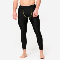 Legginsy do MMA męskie. Czarne szorty męskie DOMYOS, bez wzorów, z materiału, sportowe. Za 99.99 zł.