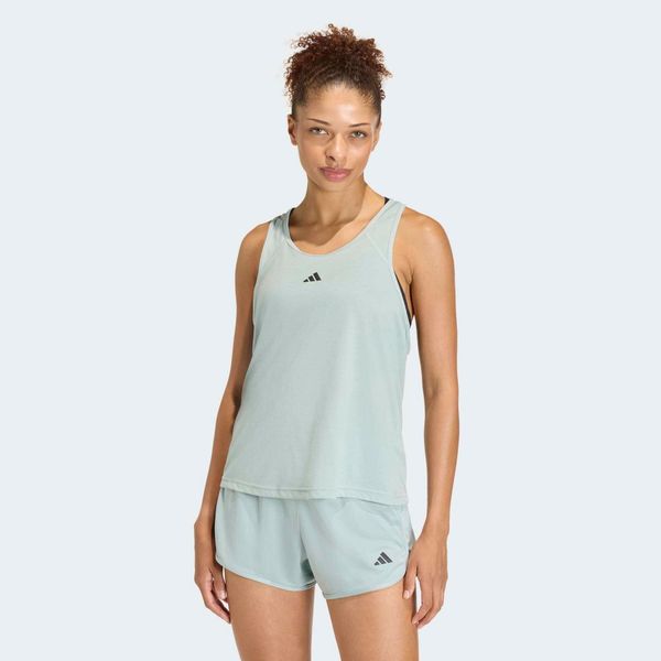Koszulka fitness bez rękawów damska ADIDAS. Zielone bluzki sportowe damskie Adidas, l, bez wzorów, z materiału, bez ramiączek. Za 119.99 zł.