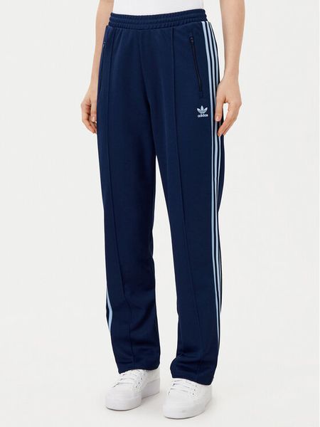 Adidas Spodnie dresowe Beckenbauer JC5793 Granatowy Regular Fit. Niebieskie spodnie dresowe damskie Adidas, xl, bez wzorów, z bawełny. Za 179.99 zł.