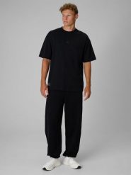 4F Regular Size: Spodnie dresowe joggery 4F | Tomasz Fornal - czarne XS. Czarne spodnie dresowe męskie 4f, bez wzorów, z dresówki. Za 199.99 zł.