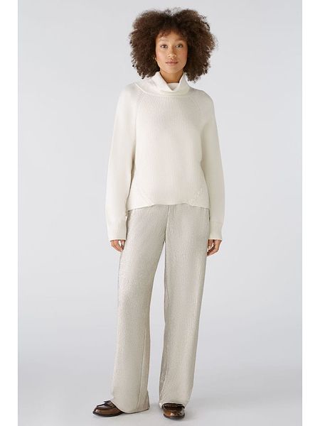 Oui Sweter w kolorze kremowym rozmiar: 42. Brązowe golfy damskie Oui, bez wzorów, bez ramiączek. Za 171.28 zł.