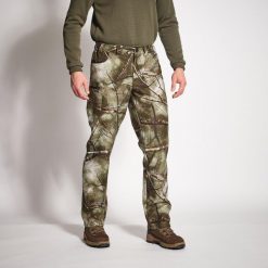 Spodnie myśliwskie Solognac 100 Warm treemetic. Brązowe spodnie materiałowe męskie SOLOGNAC, bez wzorów, z materiału, sportowe. Za 199.99 zł.