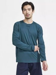Craft Koszulka sportowa "ADV Essence" w kolorze morskim rozmiar: S. Niebieskie t-shirty sportowe męskie Craft, s, z materiału, bez ramiączek, outdoorowe. Za 107.12 zł.