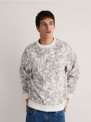 Wzorzysta bluza - złamana biel. Bluzy bez kaptura męskie Reserved, l, z dzianiny. W wyprzedaży za 49.99 zł.