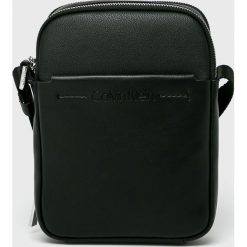 Calvin Klein - Saszetka. Niebieskie saszetki męskie CALVIN KLEIN, z materiału. W wyprzedaży za 249.90 zł.