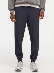 Jack & Jones Spodnie dresowe Morgan 12257964 Granatowy Regular Fit. Niebieskie spodnie dresowe męskie Jack & Jones, bez wzorów, z dresówki. Za 109.99 zł.