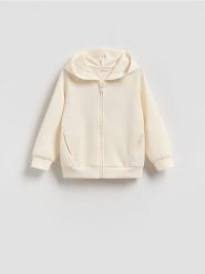 Bluza z kapturem z modalem - złamana biel. Bluzy i bluzki niemowlęce Reserved, bez wzorów, z dzianiny, bez ramiączek, z kapturem. Za 55.99 zł.