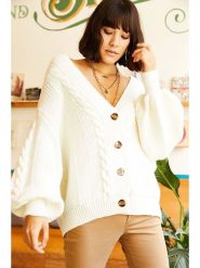 Olalook Kardigan w kolorze kremowym rozmiar: onesize. Brązowe kardigany damskie Olalook, bez wzorów, ze splotem. Za 109.00 zł.