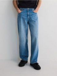 Jeansy baggy z efektem sprania - niebieski. Niebieskie jeansy męskie Reserved. W wyprzedaży za 89.99 zł.