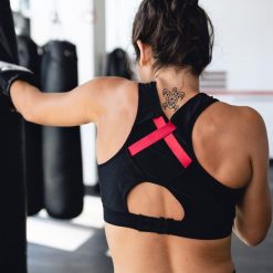 Biustonosz damski na ramiączkach Thuasne. Czarne biustonosze sportowe damskie THUASNE, bez wzorów, z poliamidu. Za 364.00 zł.