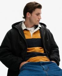 Superdry Kurtka z kapturem Canvas Surplus z bawełny z pikowaną podszewką. Czarne kurtki damskie Superdry., m, z aplikacjami, z bawełny, z kapturem. Za 381.50 zł.