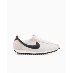 Buty Sportowe Damskie Nike W Ld‑1000. Białe buty sportowe na co dzień damskie Nike, bez wzorów, do biegania. Za 303.60 zł.