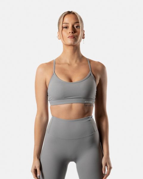 Damski stanik sportowy LuxForm, efekt drugiej skóry – szary. Szare biustonosze sportowe damskie AESTHETIC WOLF, bez wzorów, z materiału. Za 169.99 zł.