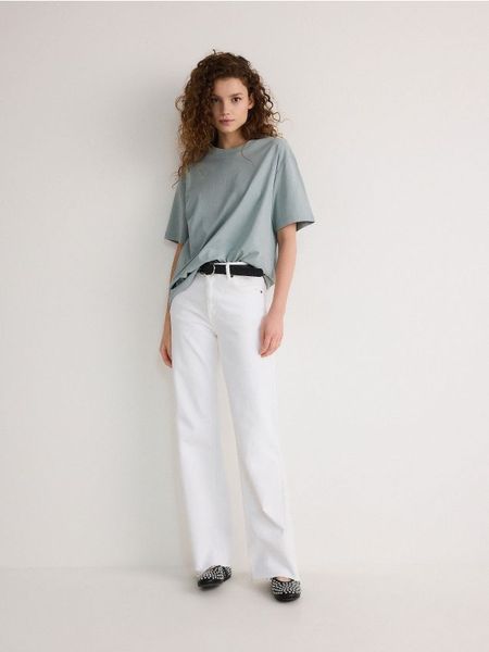 T-shirt oversize - jasnozielony. Zielone t-shirty damskie Reserved, l, bez wzorów, z bawełny, bez kołnierzyka. W wyprzedaży za 35.99 zł.